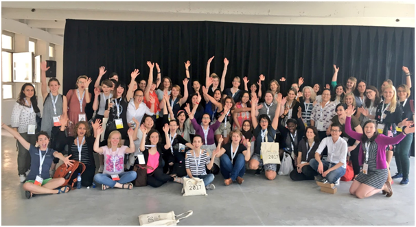 Large group of R-Ladies members posing together at the useR! 2017 conference